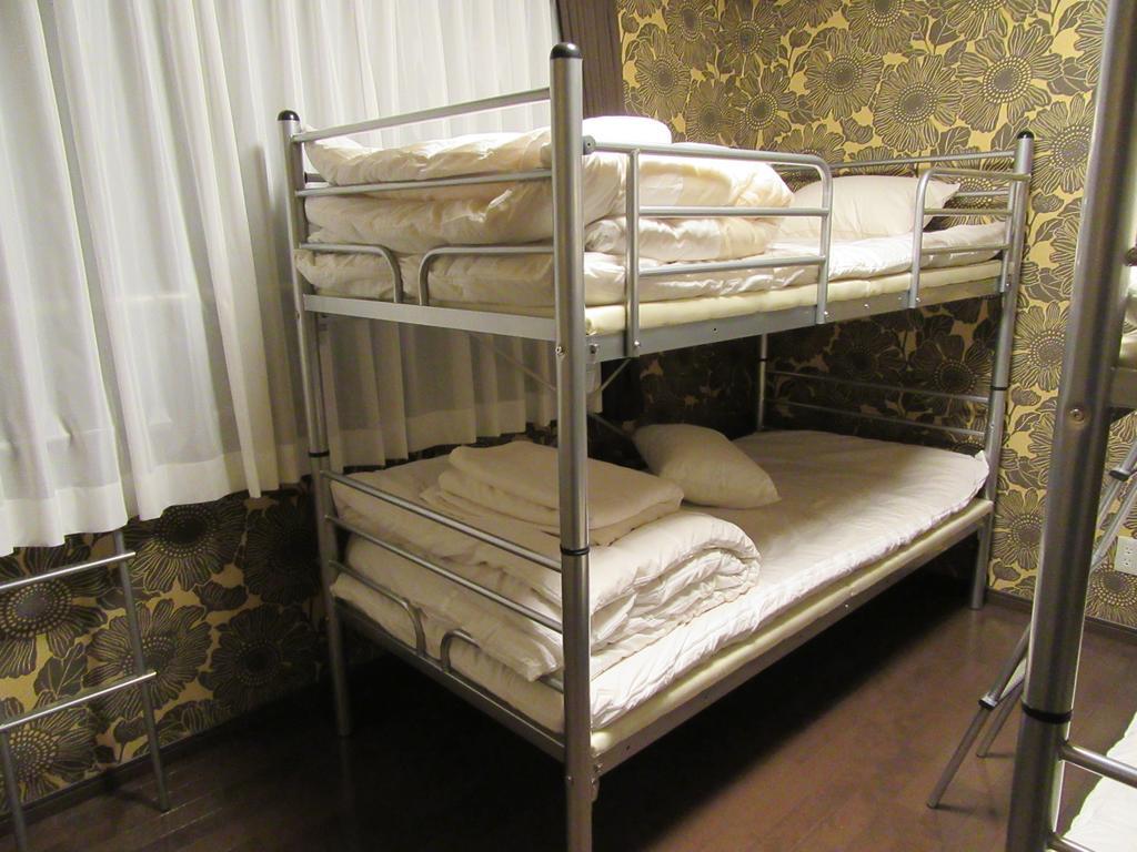 קומאמוטו Guesthouse Tiga חדר תמונה