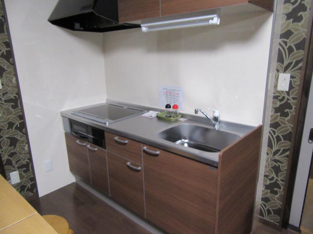 קומאמוטו Guesthouse Tiga חדר תמונה